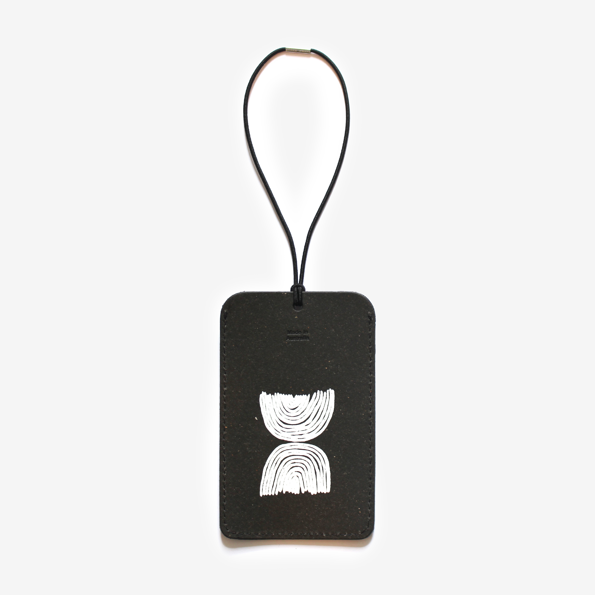 Australian made recycled leather luggage tag lucy simpson collaboration gaawaa miyay designs duality natural black
