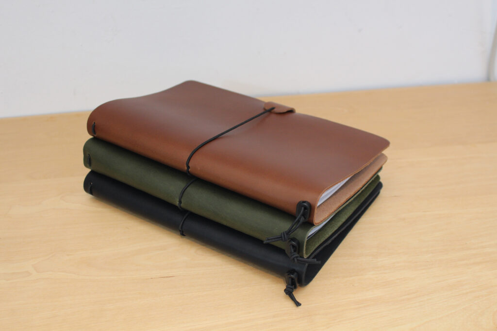 Artisan A5 Leather Journals in Tan, Black, and Dark Green